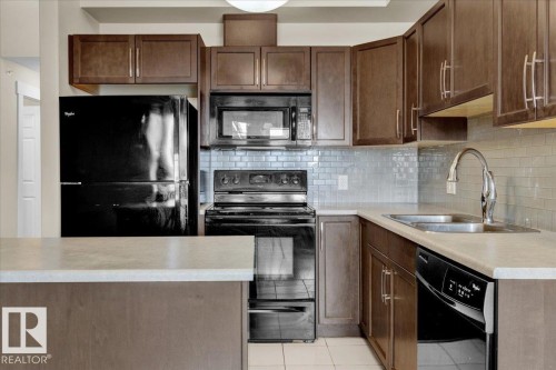417 4450 Mccrae Avenue, Edmonton, AB - Indoor Photo Showing Kitchen With Double Sink