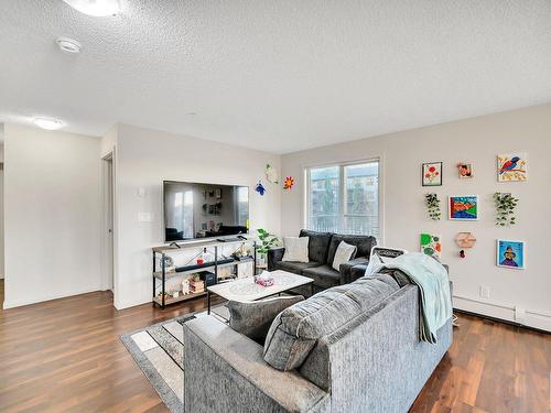 219 5515 7 Avenue, Edmonton, AB - Indoor Photo Showing Living Room