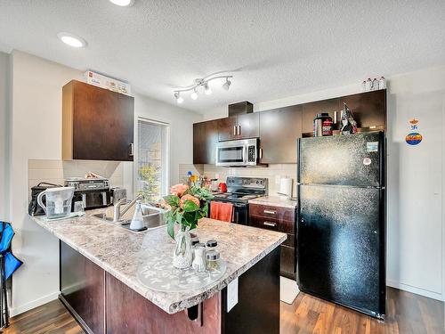 219 5515 7 Avenue, Edmonton, AB - Indoor Photo Showing Kitchen