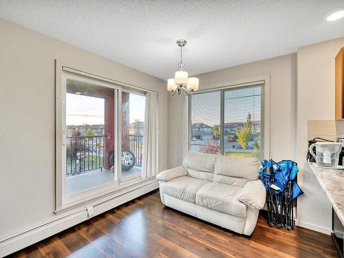 219 5515 7 Avenue, Edmonton, AB - Indoor Photo Showing Living Room