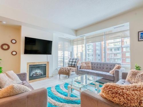 304 2510 109 Street, Edmonton, AB - Indoor Photo Showing Living Room With Fireplace