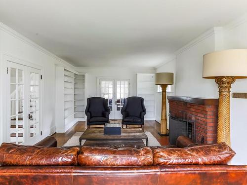 11619 Saskatchewan Drive, Edmonton, AB - Indoor Photo Showing Living Room With Fireplace