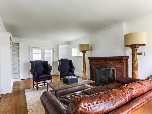 11619 Saskatchewan Drive, Edmonton, AB - Indoor Photo Showing Living Room With Fireplace