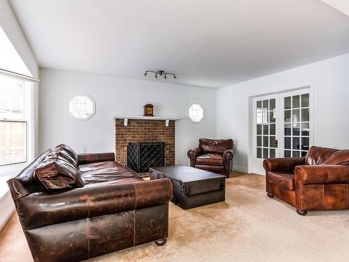 11619 Saskatchewan Drive, Edmonton, AB - Indoor Photo Showing Living Room With Fireplace