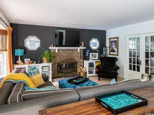 11619 Saskatchewan Drive, Edmonton, AB - Indoor Photo Showing Living Room With Fireplace