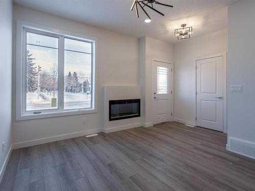 10446 142 Street, Edmonton, AB - Indoor Photo Showing Living Room With Fireplace