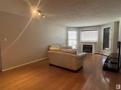 109 10511 42 Avenue, Edmonton, AB - Indoor Photo Showing Living Room With Fireplace