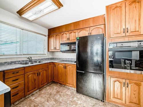 13228 68 Street, Edmonton, AB - Indoor Photo Showing Kitchen With Double Sink