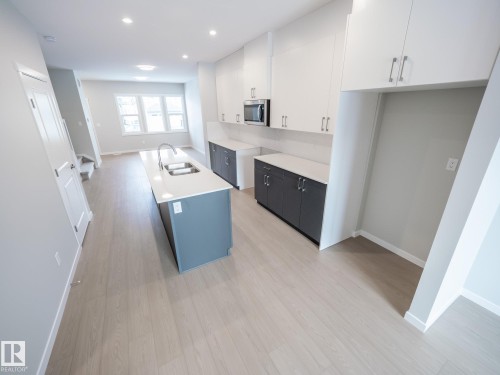 17674 69 A Street, Edmonton, AB - Indoor Photo Showing Kitchen With Double Sink