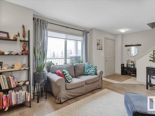 54 1150 Windermere Way, Edmonton, AB - Indoor Photo Showing Living Room