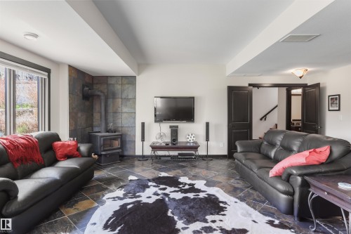 51425 Rge Rd 80, Rural Parkland County, AB - Indoor Photo Showing Living Room With Fireplace