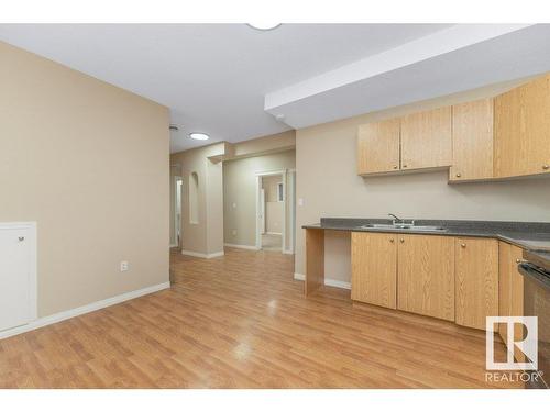 2423 35 Av Nw, Edmonton, AB - Indoor Photo Showing Kitchen With Double Sink