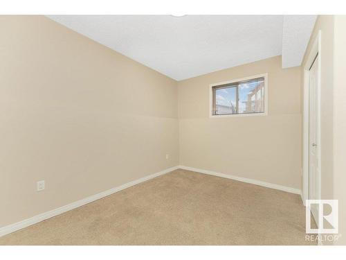 2423 35 Av Nw, Edmonton, AB - Indoor Photo Showing Other Room