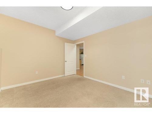 2423 35 Av Nw, Edmonton, AB - Indoor Photo Showing Other Room