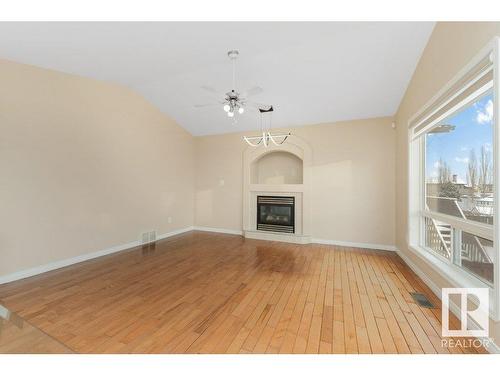 2423 35 Av Nw, Edmonton, AB - Indoor With Fireplace