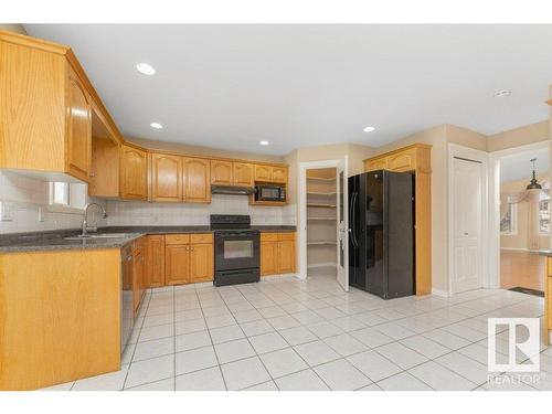 2423 35 Av Nw, Edmonton, AB - Indoor Photo Showing Kitchen