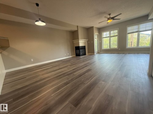 304 9803 96A Street, Edmonton, AB - Indoor With Fireplace