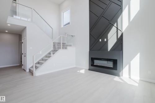 147 Caledonia Drive, Leduc, AB - Indoor With Fireplace