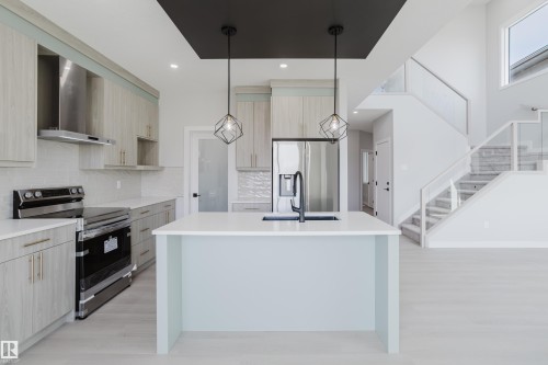 147 Caledonia Drive, Leduc, AB - Indoor Photo Showing Kitchen With Upgraded Kitchen