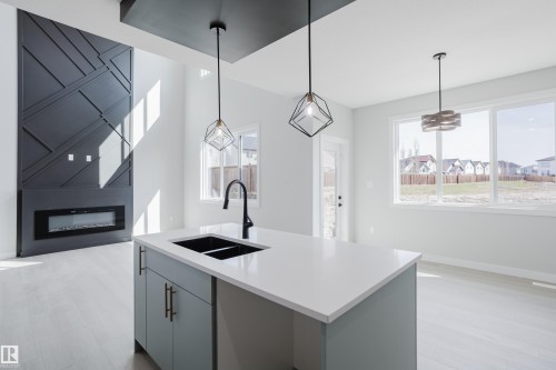 147 Caledonia Drive, Leduc, AB - Indoor Photo Showing Kitchen With Double Sink