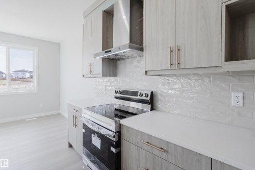 147 Caledonia Drive, Leduc, AB - Indoor Photo Showing Kitchen