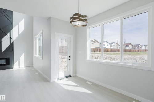 147 Caledonia Drive, Leduc, AB - Indoor With Fireplace