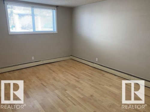 101 8215 83 Avenue, Edmonton, AB - Indoor Photo Showing Other Room