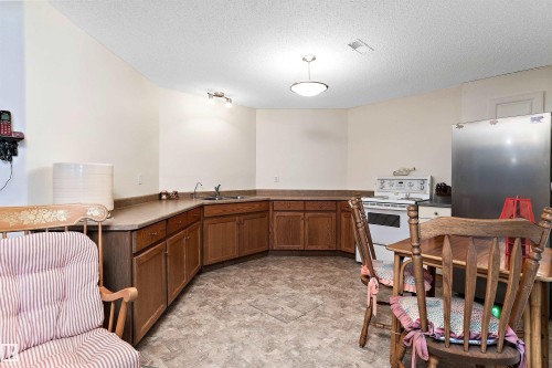 49229 Range Rd 263, Rural Leduc County, AB - Indoor Photo Showing Kitchen With Double Sink