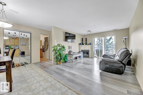344 2096 Blackmud Creek Drive, Edmonton, AB - Indoor Photo Showing Living Room