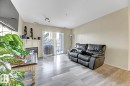 344 2096 Blackmud Creek Drive, Edmonton, AB  - Indoor Photo Showing Living Room With Fireplace 