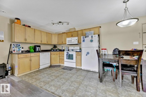 344 2096 Blackmud Creek Drive, Edmonton, AB - Indoor Photo Showing Kitchen With Double Sink