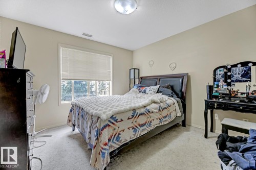 344 2096 Blackmud Creek Drive, Edmonton, AB - Indoor Photo Showing Bedroom