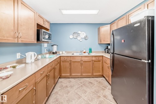 344 2096 Blackmud Creek Drive, Edmonton, AB - Indoor Photo Showing Kitchen With Double Sink