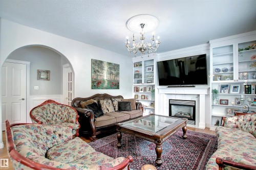 329 Heath Road, Edmonton, AB - Indoor Photo Showing Living Room With Fireplace