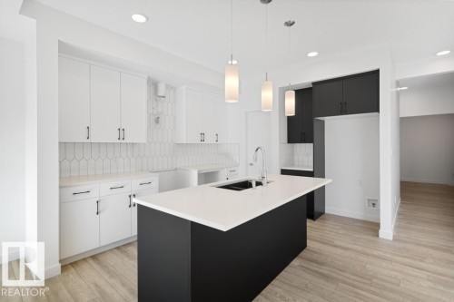 364 Bluff Cove, Leduc, AB - Indoor Photo Showing Kitchen With Upgraded Kitchen