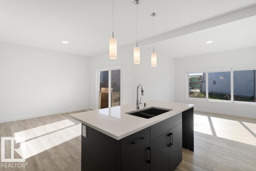 364 Bluff Cove, Leduc, AB - Indoor Photo Showing Kitchen With Double Sink