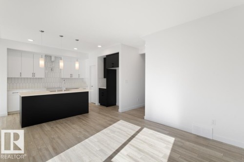 364 Bluff Cove, Leduc, AB - Indoor Photo Showing Kitchen With Double Sink