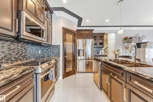 16756 60 Street, Edmonton, AB - Indoor Photo Showing Kitchen With Double Sink With Upgraded Kitchen