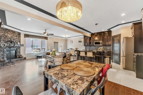 16756 60 Street, Edmonton, AB - Indoor Photo Showing Other Room With Fireplace