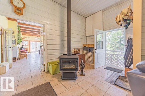 58031 Range Road 21, Rural Barrhead County, AB - Indoor With Fireplace