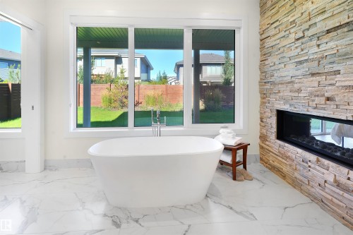 11 Jubilation Drive, St. Albert, AB - Indoor Photo Showing Bathroom With Fireplace