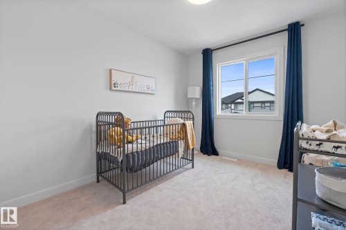 103 Dansereau Way, Beaumont, AB - Indoor Photo Showing Bedroom