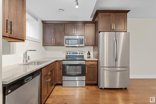 9654 83 Avenue, Edmonton, AB - Indoor Photo Showing Kitchen With Upgraded Kitchen