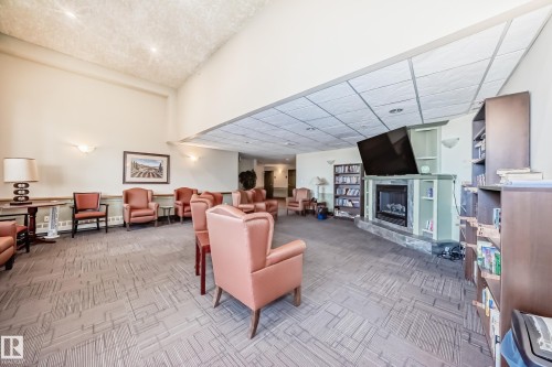 321 8802 Southfort, Fort Saskatchewan, AB - Indoor With Fireplace