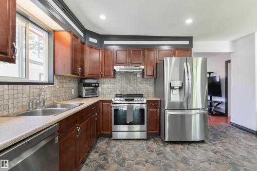 6130 Highway 16, Rural Parkland County, AB - Indoor Photo Showing Kitchen With Double Sink