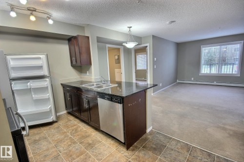 Edmonton, AB - Indoor Photo Showing Kitchen With Double Sink
