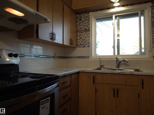 10719 152 Street, Edmonton, AB - Indoor Photo Showing Kitchen With Double Sink