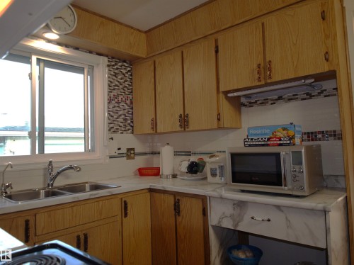 10719 152 Street, Edmonton, AB - Indoor Photo Showing Kitchen With Double Sink