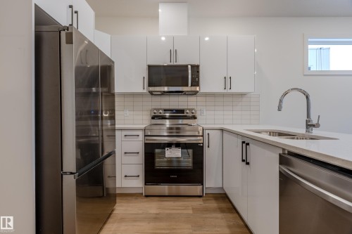 4921 50 Avenue, Legal, AB - Indoor Photo Showing Kitchen With Double Sink With Upgraded Kitchen