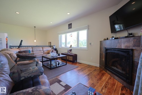 240002 Twp Rd 674, Rural Athabasca County, AB - Indoor Photo Showing Living Room With Fireplace
